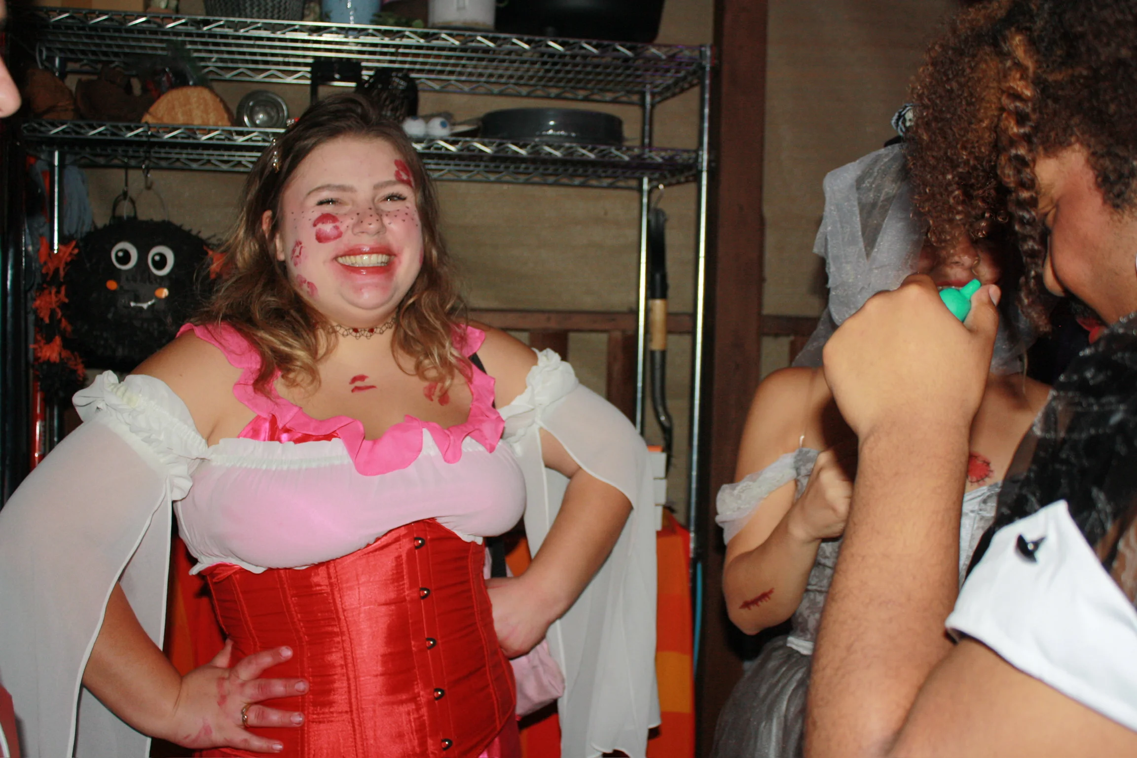 Guest posing in a colorful Halloween costume